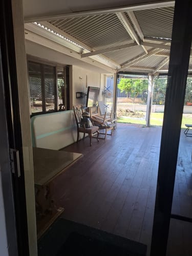 Reviewer's glass back door is so clean it looks open after using the KoalaCloth.